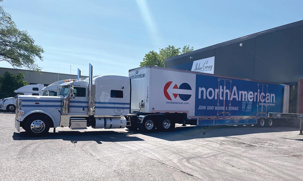 North American Van Lines truck docked at John Gray Moving & Storage location.